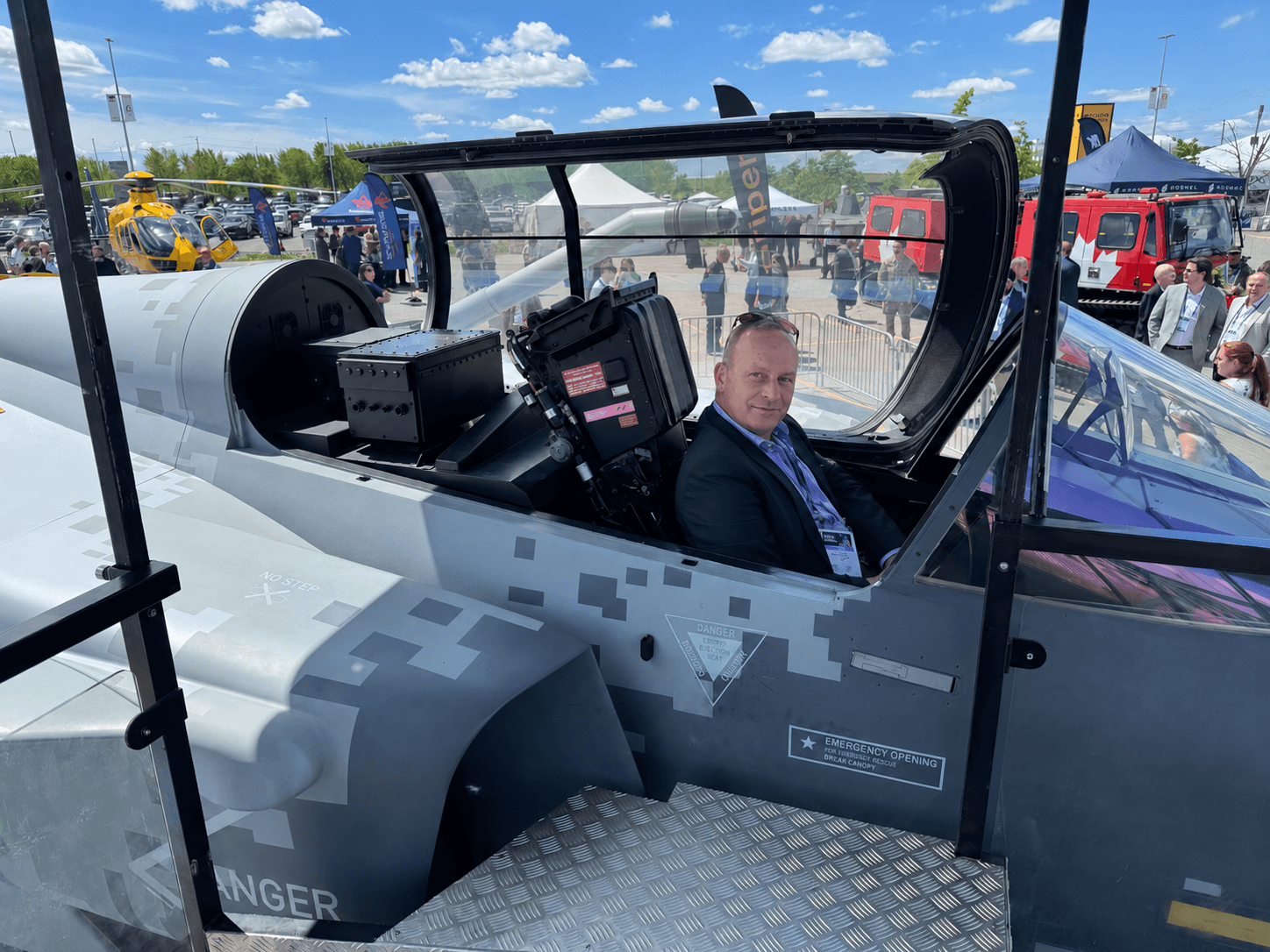 Rob Gorrie in the cockpit of a fighter jet at CANSEC 2026, Ottawa
